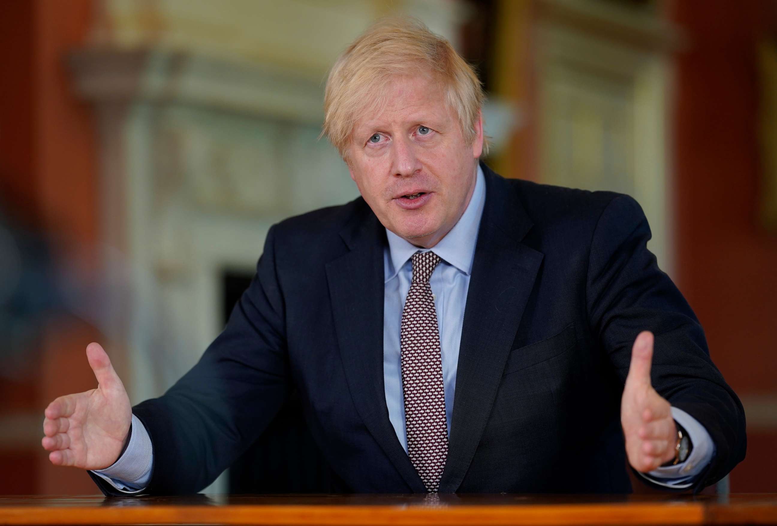 PHOTO: LONDON, ENGLAND - In this handout image provided by No 10 Downing Street, Britain's Prime Minister Boris Johnson records a televised message to the nation released on May 10, 2020 in London, England. 