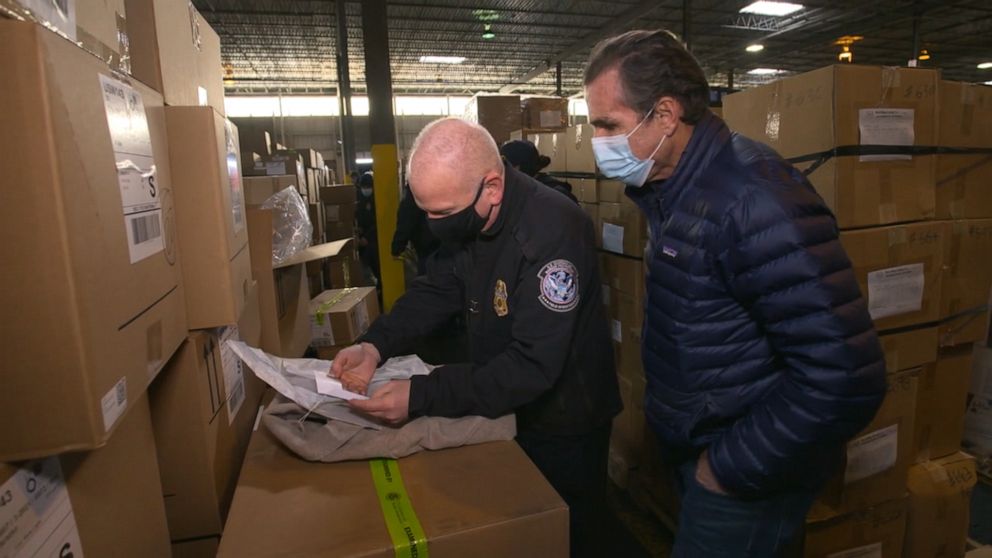 PHOTO: U.S. Customs and Border Protection Port Director Ed Fox shows ABC News products that were allegedly made via slave labor in China's Xinjiang province.