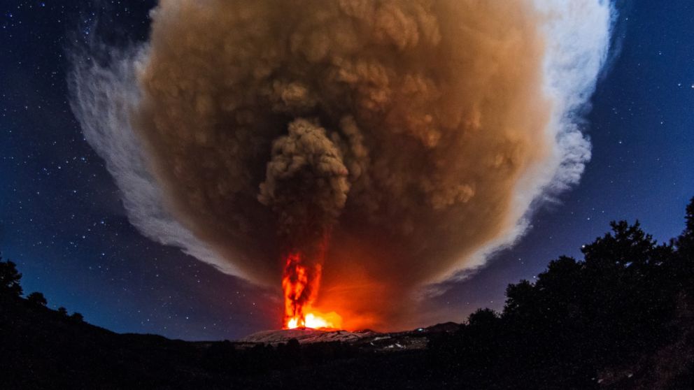 PHOTO: A massive volcanic plume emerges from Voragine crater as Mount Etna erupts in Sicily, Italy, Dec. 3, 2015.