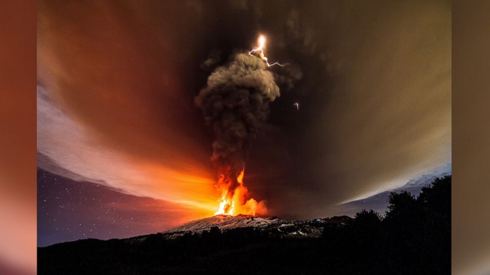 PHOTO: A dirty thunderstorm and volcanic lightning are seen above Mt. Etna in Sicily, Italy, Dec. 3, 2015.