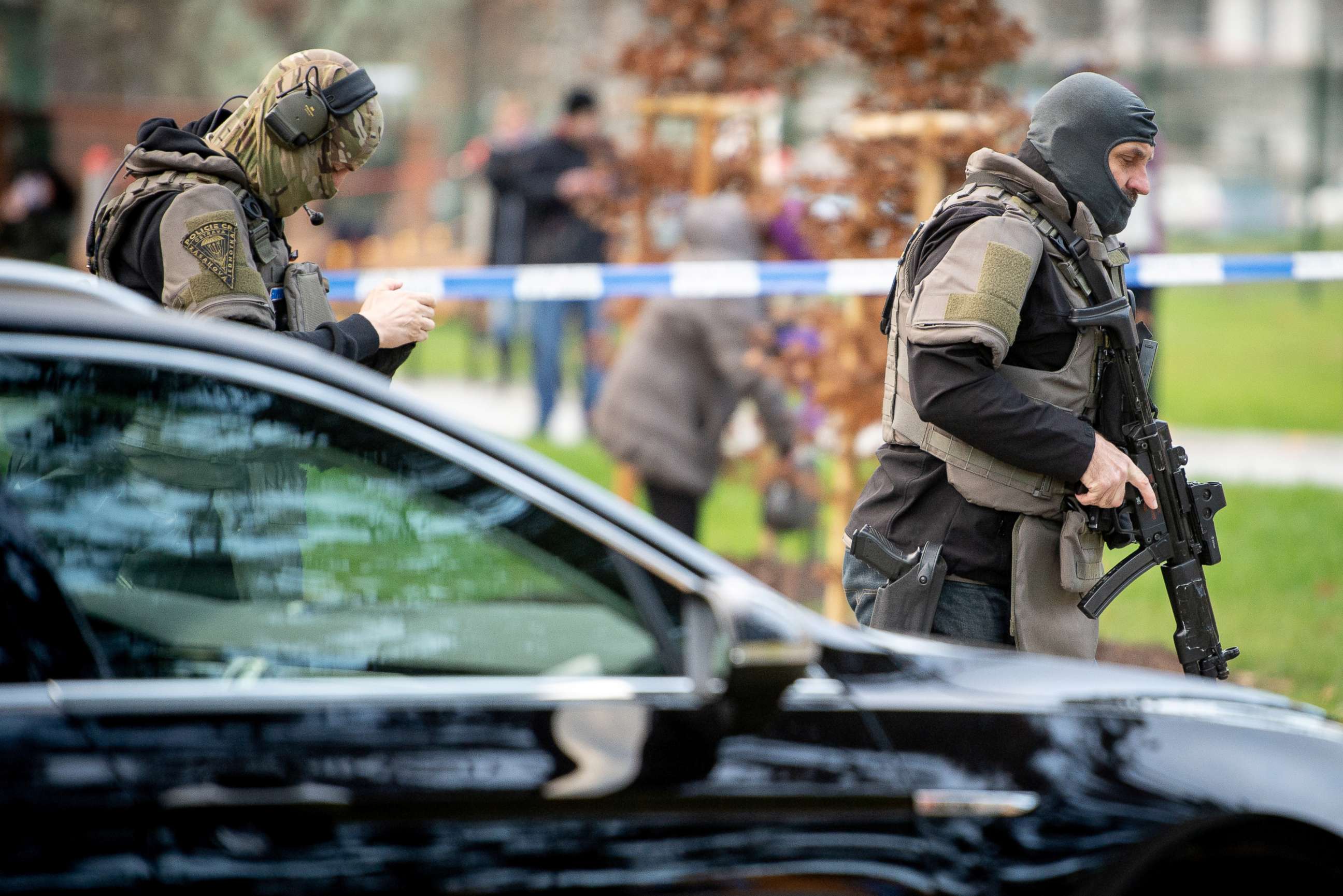 PHOTO: Police officers are seen near the site of a shooting in front of a hospital in Ostrava, Czech Republic, December 10, 2019.   REUTERS/Lukas Kabon