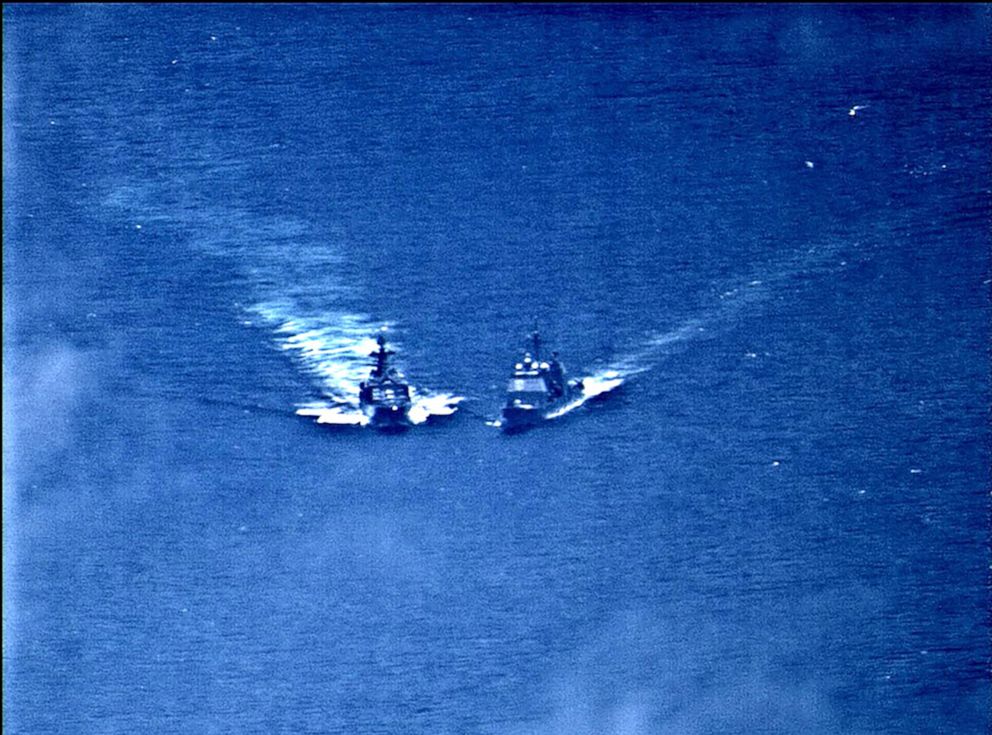 PHOTO: A surveillance photo shows a Russian naval destroyer making what the U.S. Navy describes as an unsafe maneuver against the Ticonderoga-class guided-missile cruiser USS Chancellorsville in the Philippine Sea, June 7, 2019.