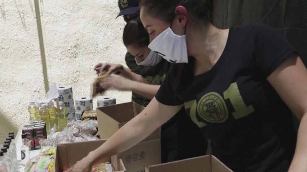PHOTO: A volunteer group associated with a company owned by Alejandrina Guzman, Mexican drug lord El Chapo's daughter, has been handing out essentials during the COVID-19 pandemic. 