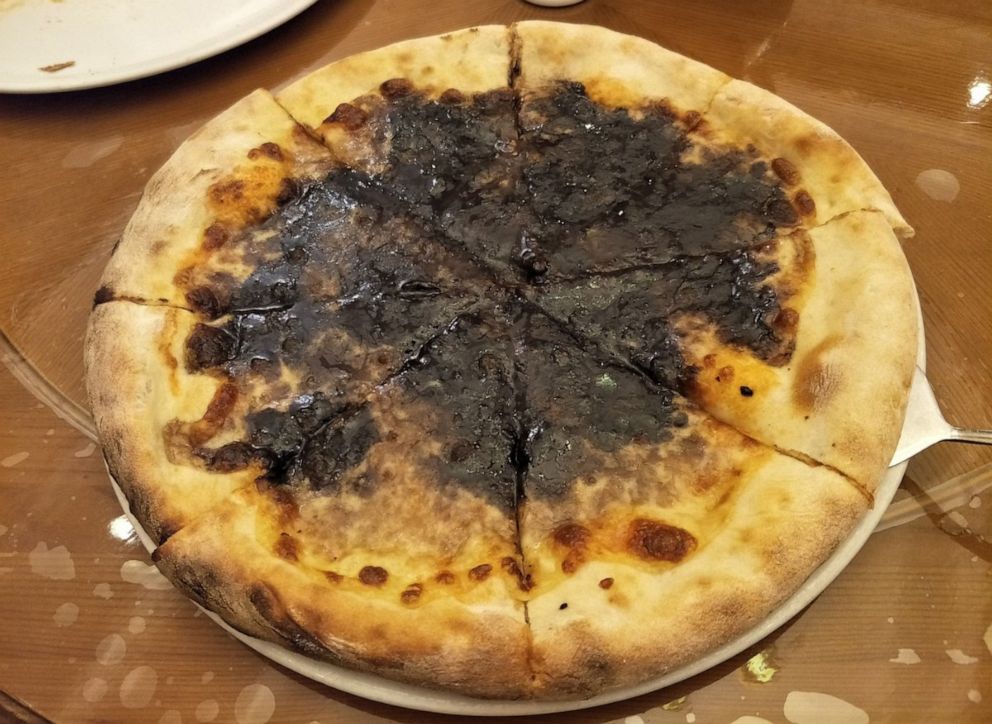 PHOTO: Chocolate pizza is served at the Italian cuisine specialty restaurant, Pyongyang, North Korea, June 19, 2019.