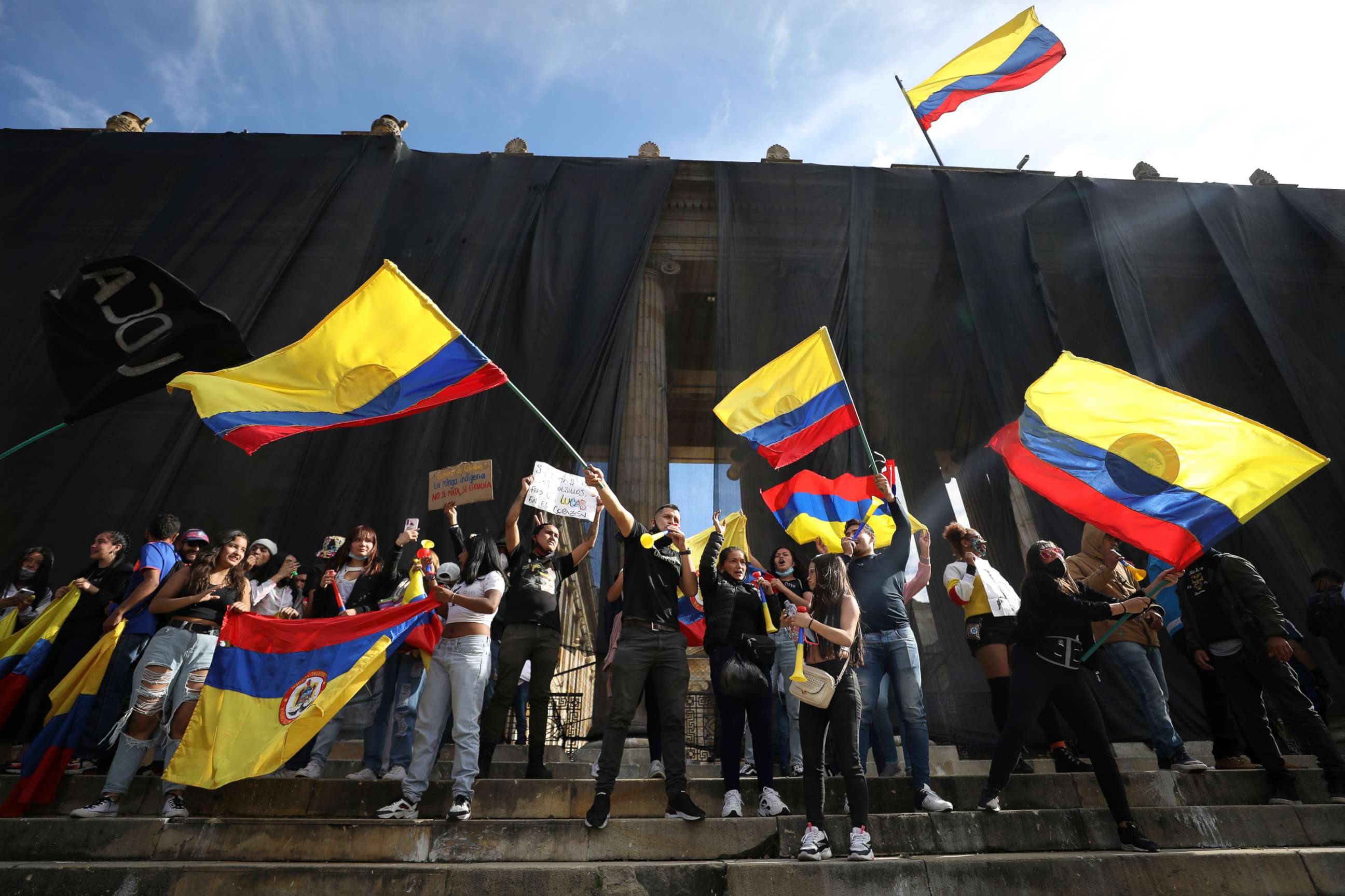 PHOTO: Demonstrators attend an anti-government protest on the steps of the Congress building in Plaza Bolivar in Bogota, Colombia, May 12, 2021.