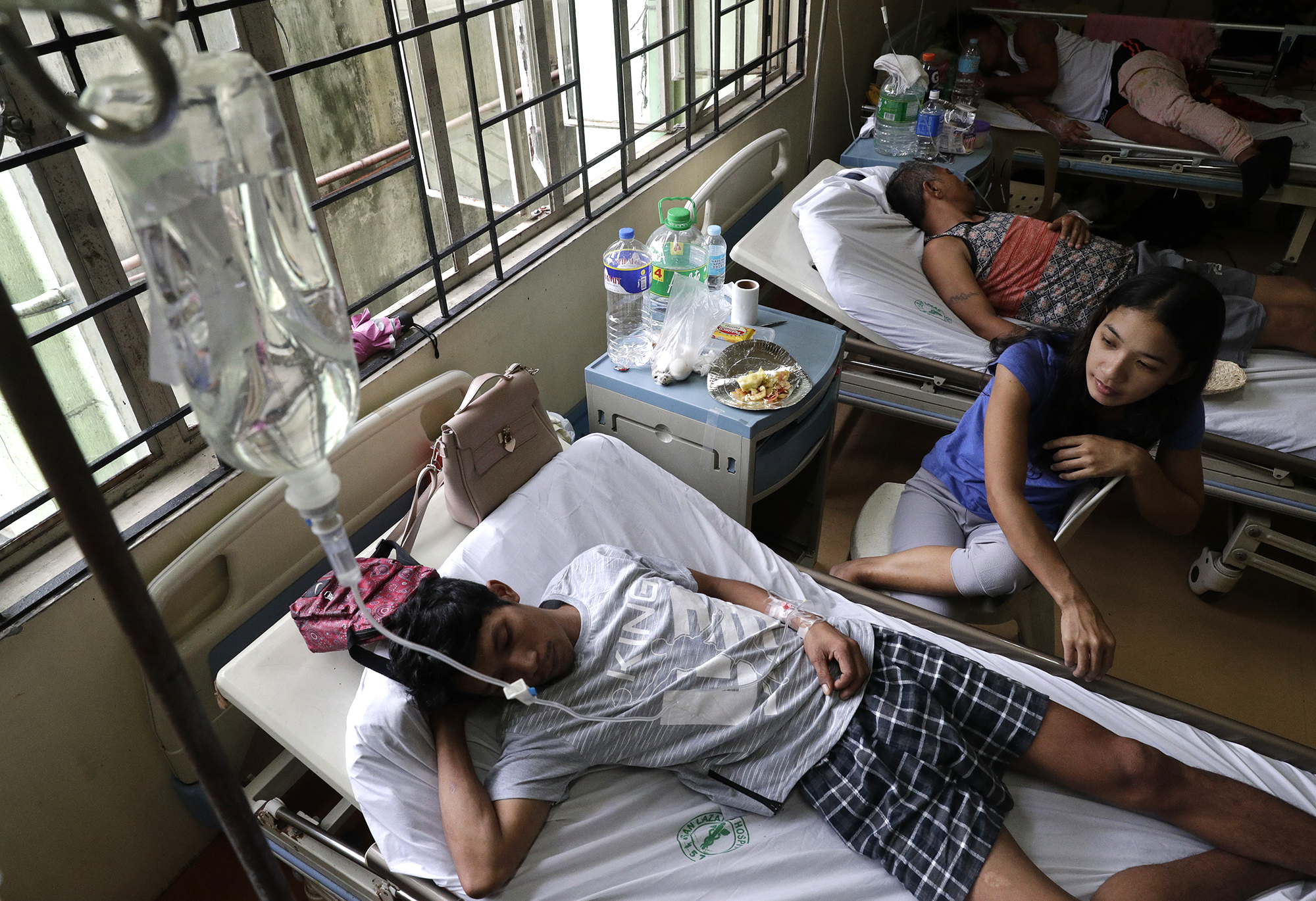 PHOTO: Dengue patients lie inside a room at the San Lazaro government hospital in Manila, Philippines, Aug. 7, 2019. 