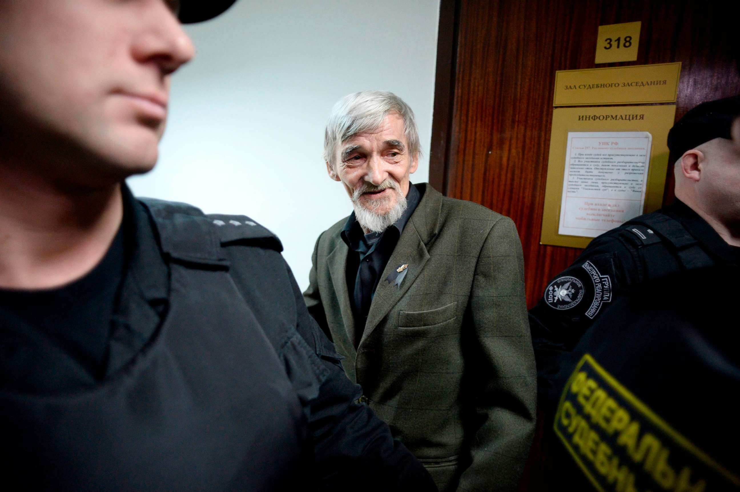 PHOTO: In this file photo taken on April 05, 2018 Russian historian Yury Dmitriyev, who heads rights group Memorial's branch in Karelia, arrives for the verdict in his child pornography trial at a court in the city of Petrozavodsk in northwestern Russia. 