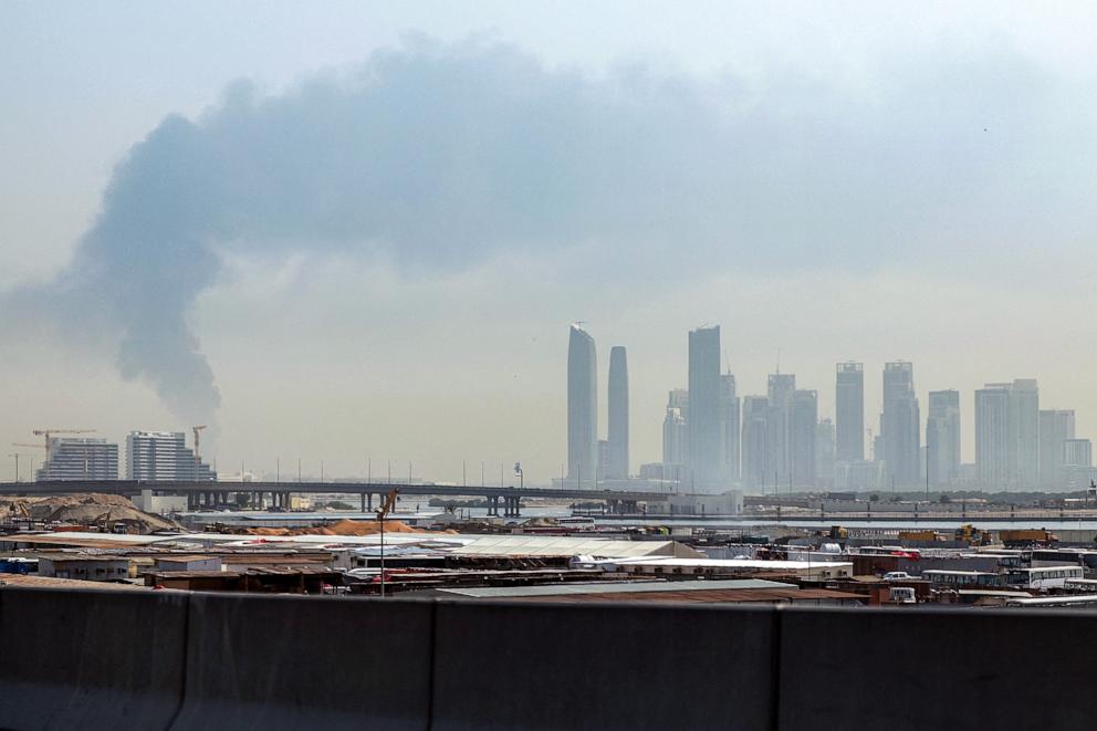 PHOTO: A smoke plume rises from an ongoing fire at Dubai International Airport in Dubai on March 16, 2026.