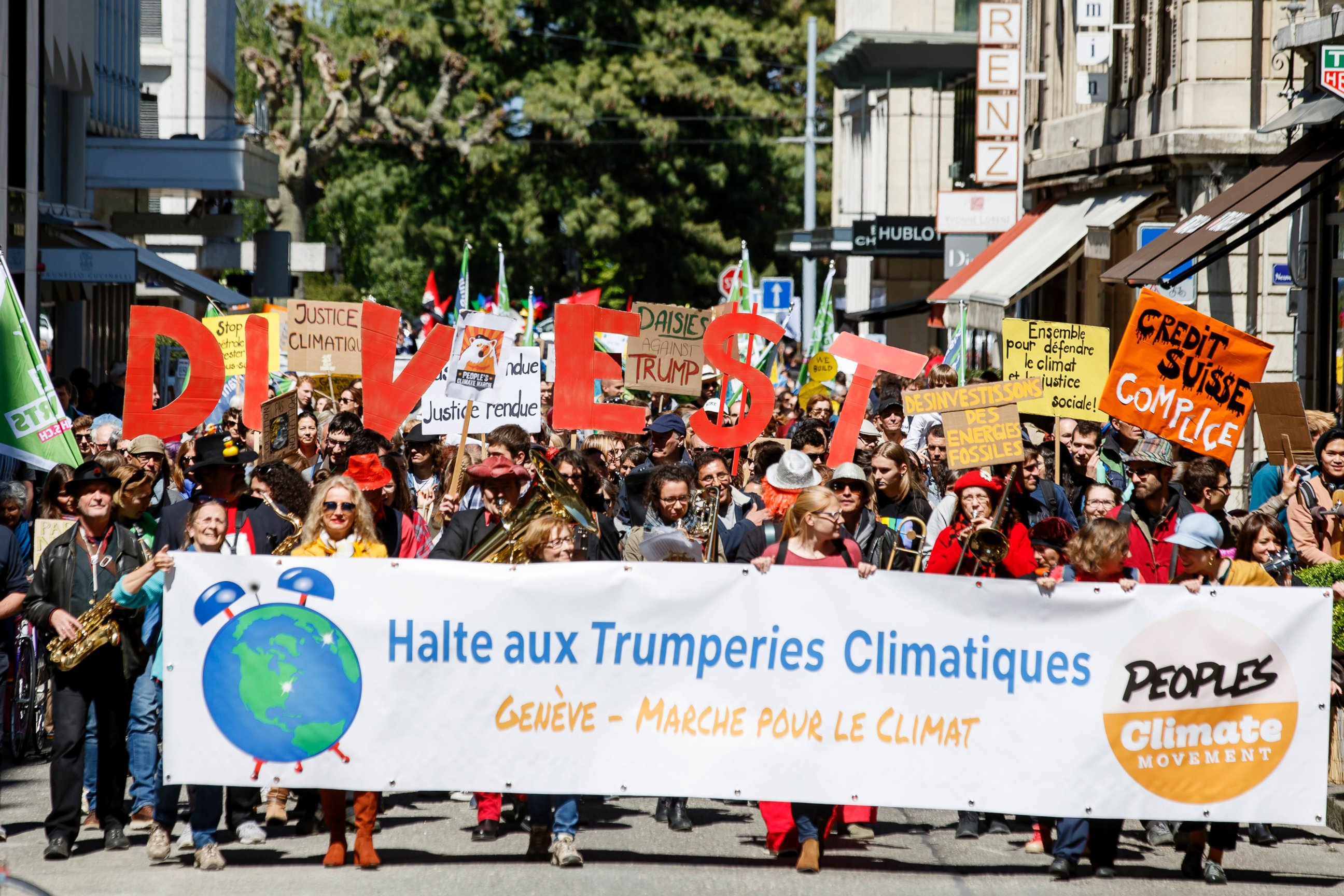 PHOTO: About five hundred protesters hold placards reading, "Stop climactic Trumperies" during the World Climate March in Geneva, Switzerland, April 29, 2017.