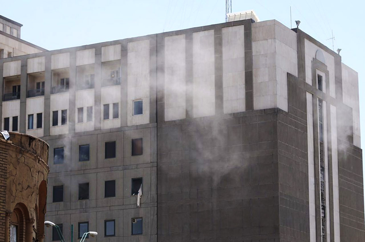 PHOTO: Smoke rise from the Iranian parliament building during an attack in Tehran, Iran, June 7, 2017.