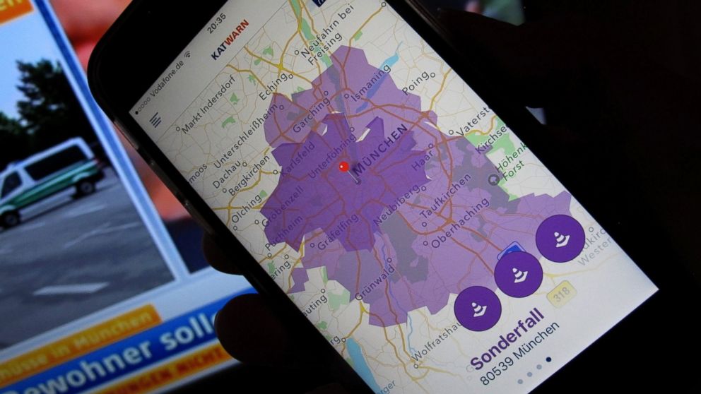 PHOTO: The smartphone warning system 'Katwarn' shows a purple area in Munich, 22 July 2016. The state capital called out a 'special case' due to an 'amok situation'. Citizens were asked to stay inside their apartments via the warning system.