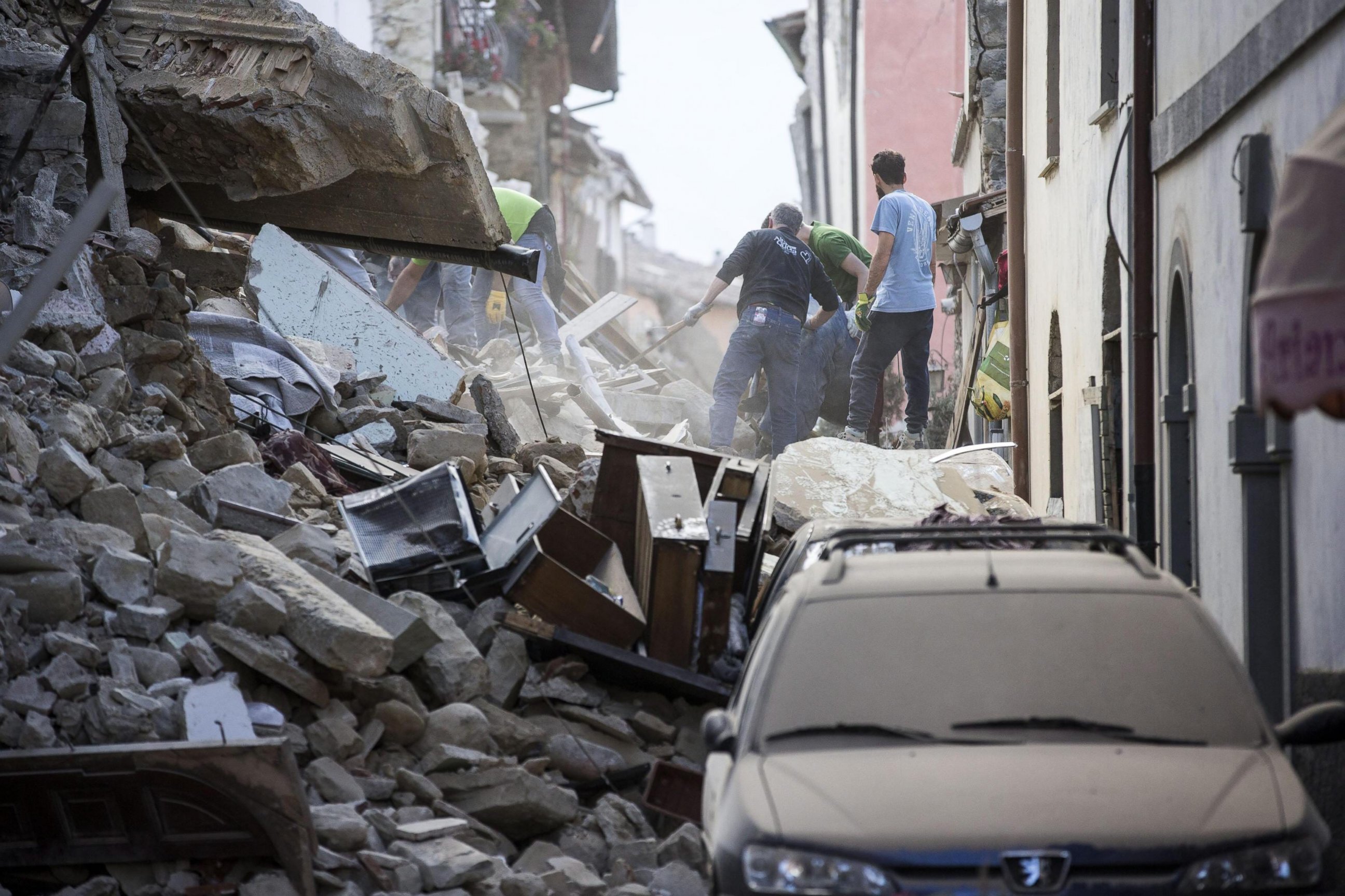 PHOTO: Search and rescue teams search for missing people amid the rubble of collapsed buildings in Amatrice, Italy, Aug. 24, 2016.