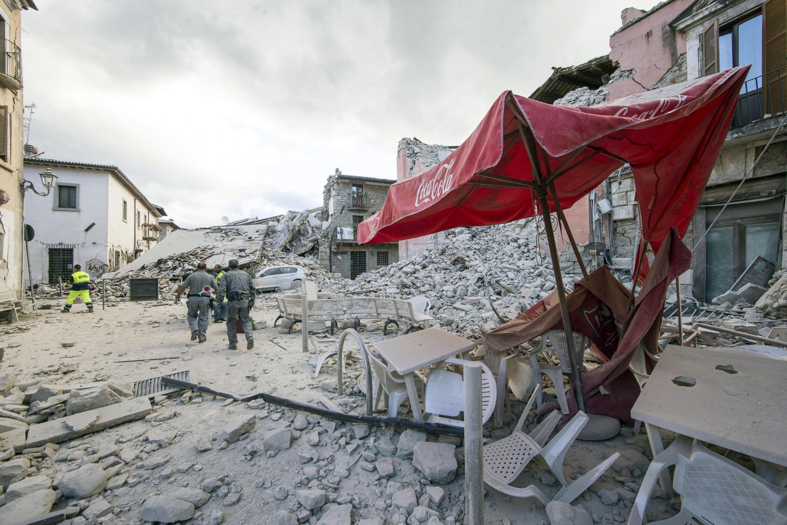 PHOTO: Search and rescue teams survey the rubble in Amatrice, central Italy, Aug. 24, 2016. 