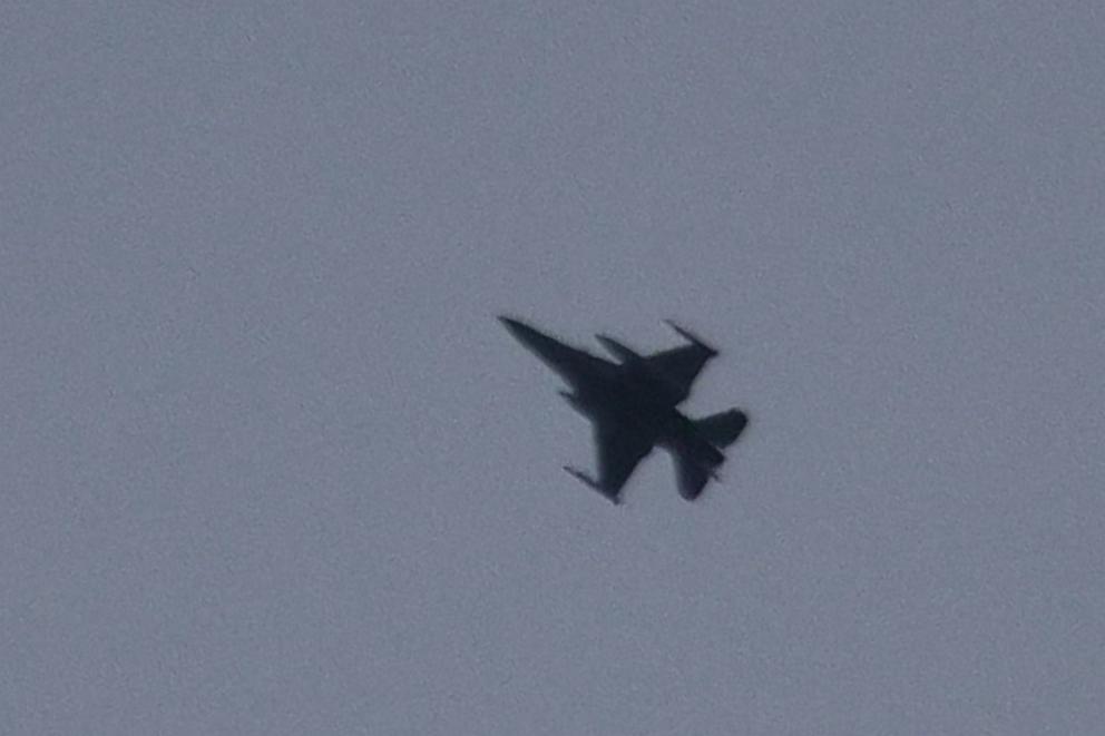 PHOTO: An Israeli Air Force F-16 fighter aircraft flies over Marjeyoun in southern Lebanon on March 28, 2026.