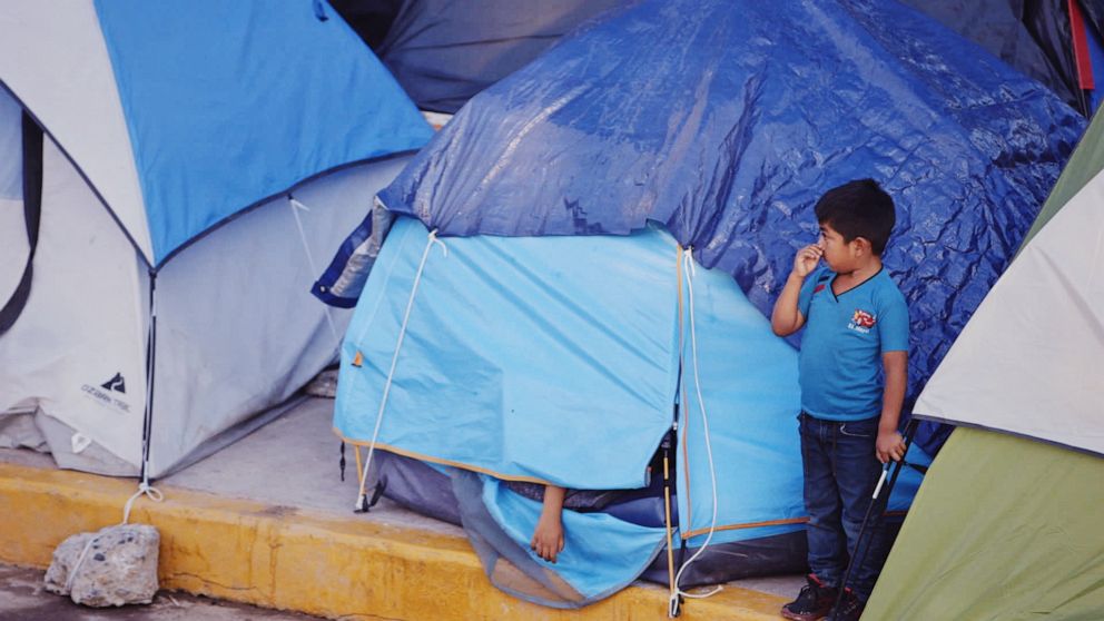 PHOTO: A boy living in a camp in Mexico near the U.S. border, where asylum seekers wait for their chance to enter the U.S. 