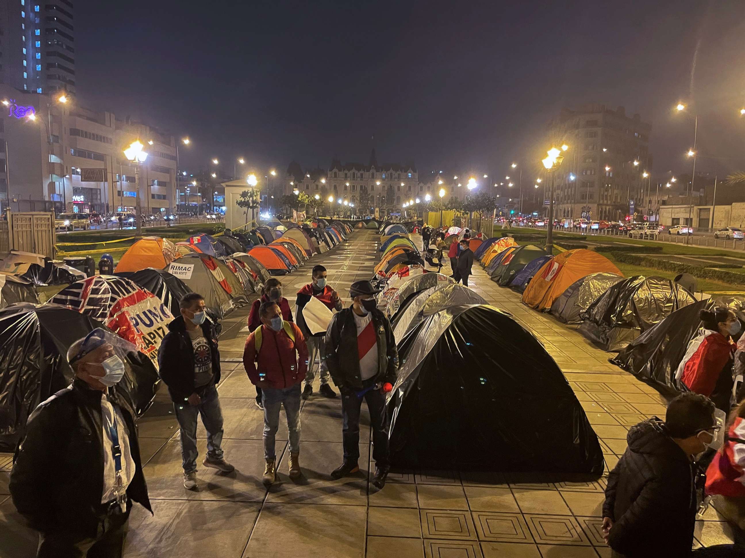 PHOTO: Supporters of right-wing candidate Keiko Fujimori camped out in front of Peru's Supreme Court demanding an audit of votes following a contested June runoff election.