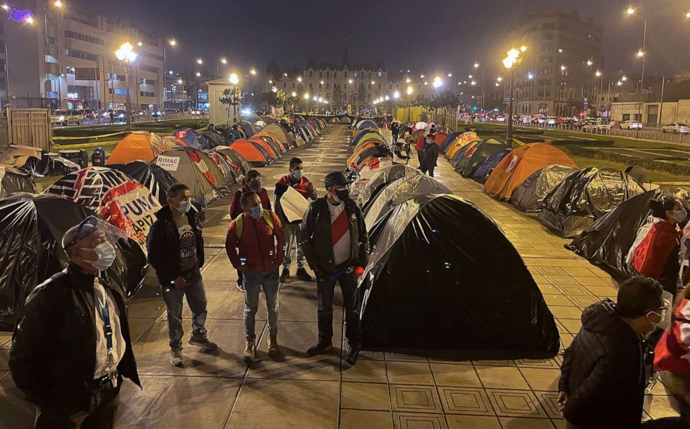 PHOTO: Supporters of right-wing candidate Keiko Fujimori camped out in front of Peru's Supreme Court demanding an audit of votes following a contested June runoff election.