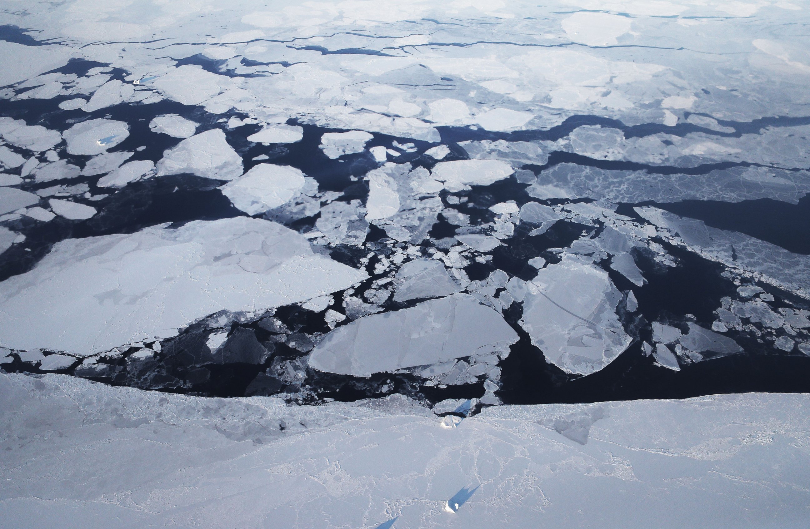 PHOTO: Sea ice is seen from NASA's Operation IceBridge research aircraft off the northwest coast, on March 30, 2017, above Greenland.