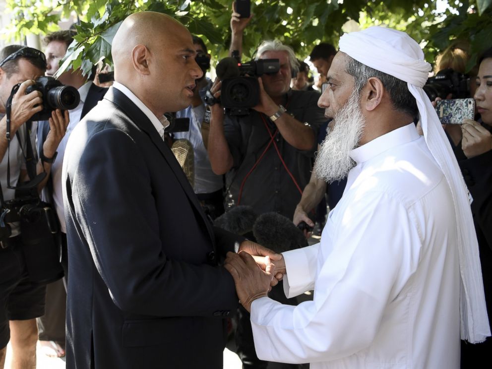 PHOTO: Secretary of State for Communities and Local Government Sajid Javid (L) speaks to an Imam at the scene of a terror attack in Finsbury Park, June 19, 2017, in London.