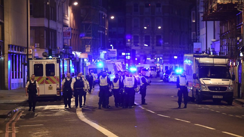 Police at the scene in Borough high street at London Bridge, on June 3, 2017, in London. Police have responded to reports of a van hitting pedestrians on London Bridge in central London.