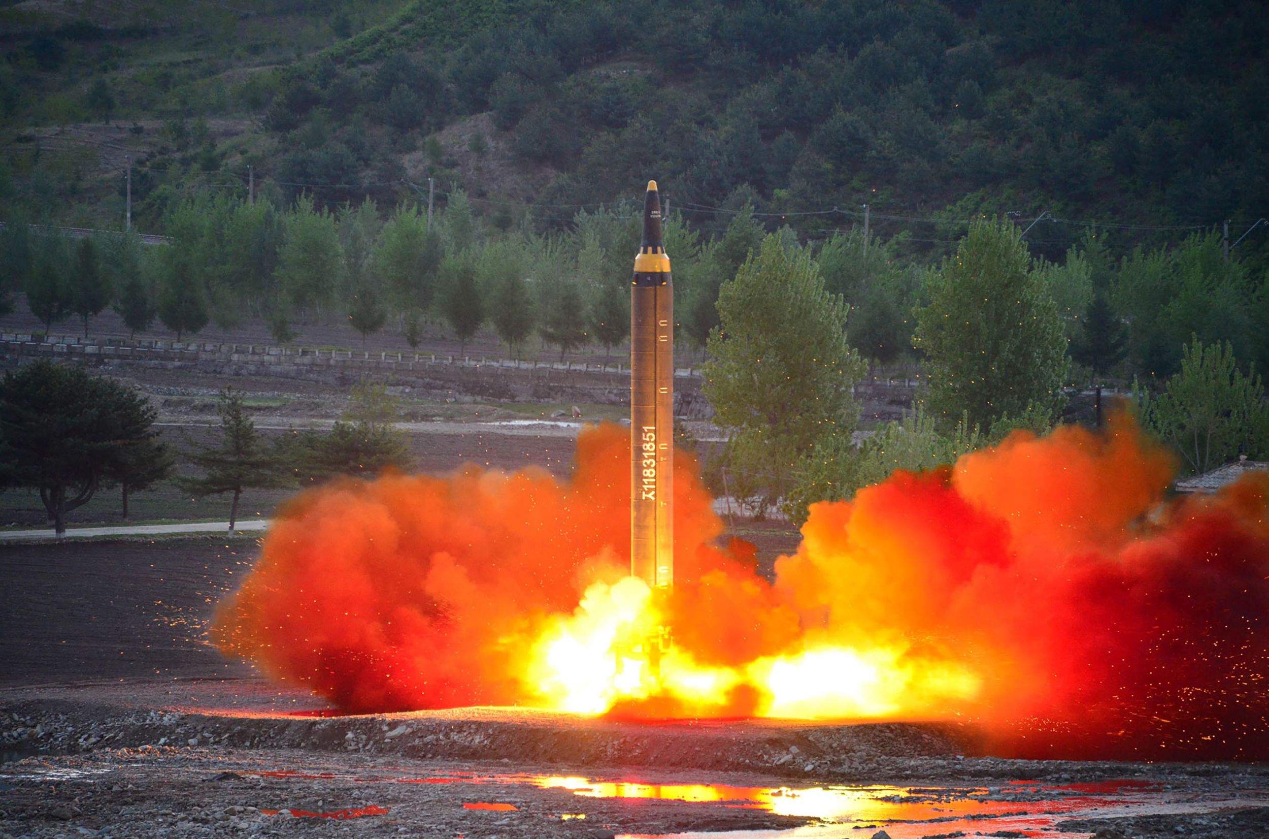 PHOTO: This picture taken on May 14, 2017 and released from North Korea's official Korean Central News Agency (KCNA) on May 15 shows a test launch of the ground-to-ground medium long-range strategic ballistic rocket Hwasong-12 at an undisclosed location. 