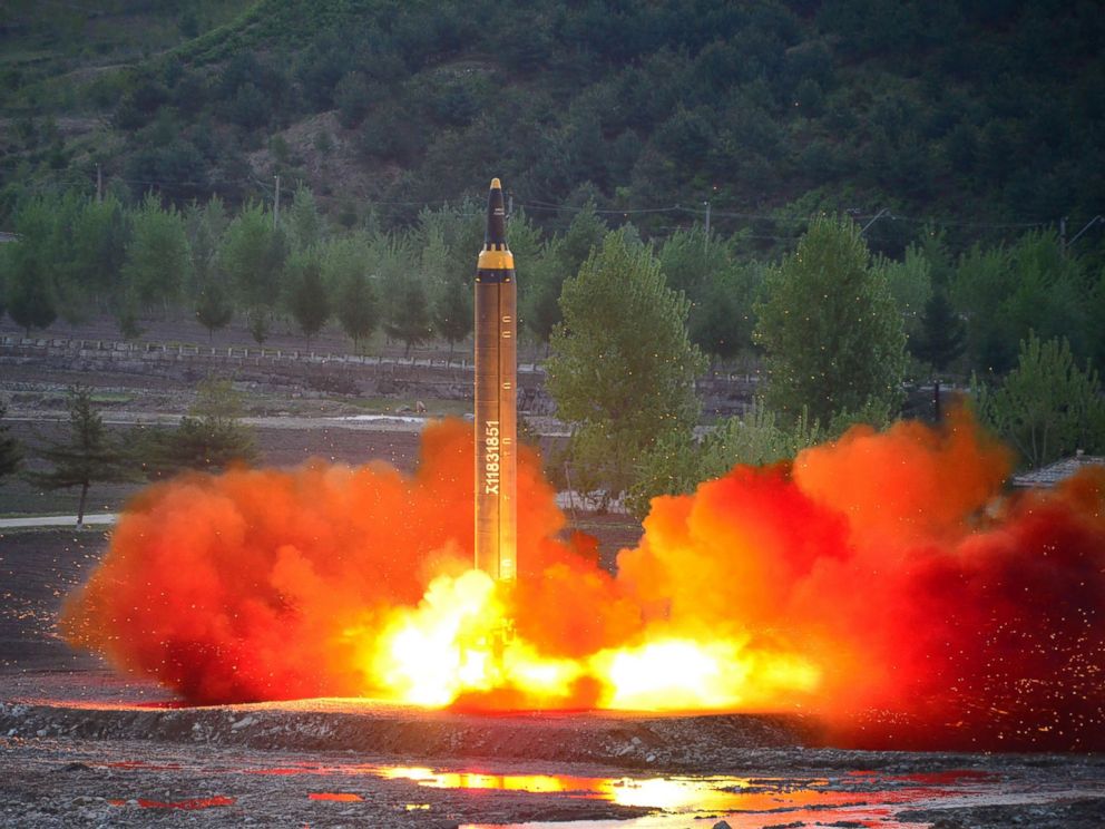 PHOTO: This picture taken on May 14, 2017 and released from North Koreas official Korean Central News Agency (KCNA) on May 15 shows a test launch of the ground-to-ground medium long-range strategic ballistic rocket Hwasong-12 at an undisclosed location.