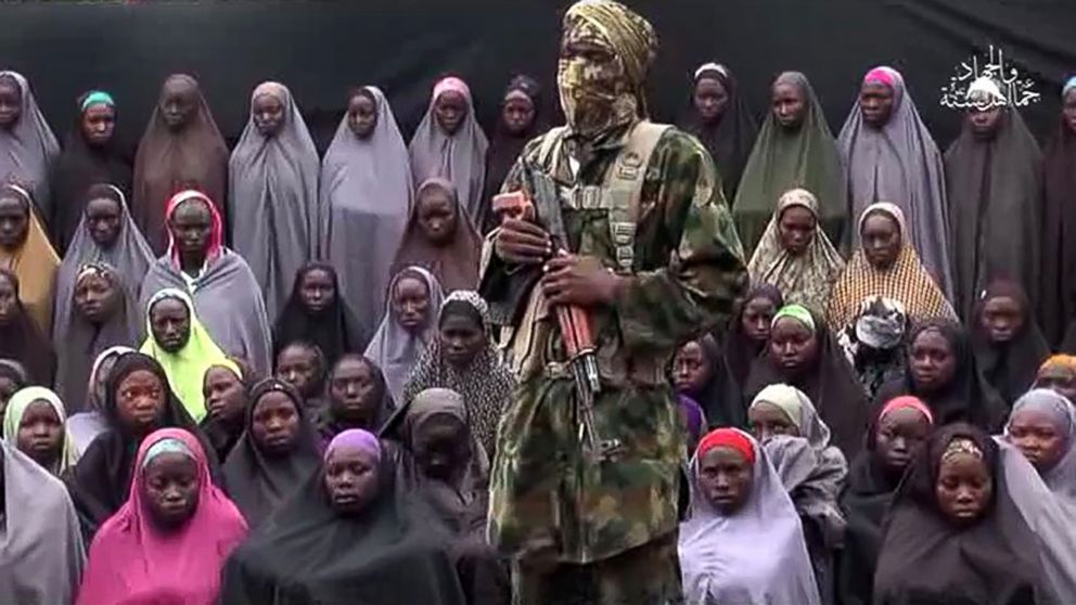 PHOTO: This video grab image created on Aug. 14, 2016, taken from a video released on youtube purportedly by Islamist group Boko Haram showing what is claimed to be one of the groups fighters at an undisclosed location.