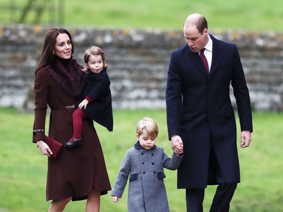 PHOTO: Britains Prince William, right, Duke of Cambridge and Catherine, Duchess of Cambridge arrive with Prince George, center, and Princess Charlotte to attend a Christmas Day service at St Marks Church in Englefield on December 25, 2016.