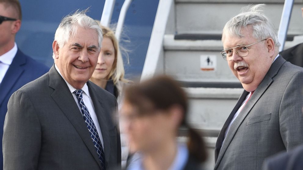 U.S. Secretary of State Rex Tillerson speaks with U.S. Ambassador to Russia John F. Tefft upon his arrival at the Vnukovo II Government airport, in Moscow, on April 11, 2017.
