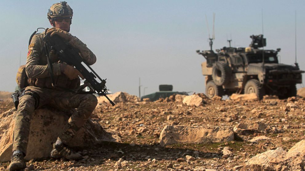 U.S. special forces monitor as Iraqi forces advance, on Feb. 23, 2017, towards Mosul airport on the southern edge of the jihadist stronghold prior to entering the airport compound for the first time since the Islamic State group overran the region in 2014.
