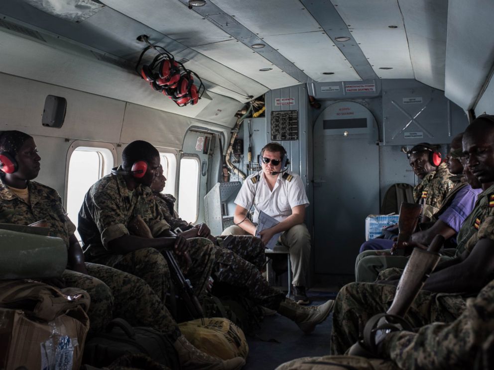 PHOTO: Members of the Uganda Peoples Defense Force (UPDF) serving in the African Union Mission in Somalia (AMISOM) travel in an United Nations helicopter on Oct. 10, 2016, departing from Mogadishu, Somalia.