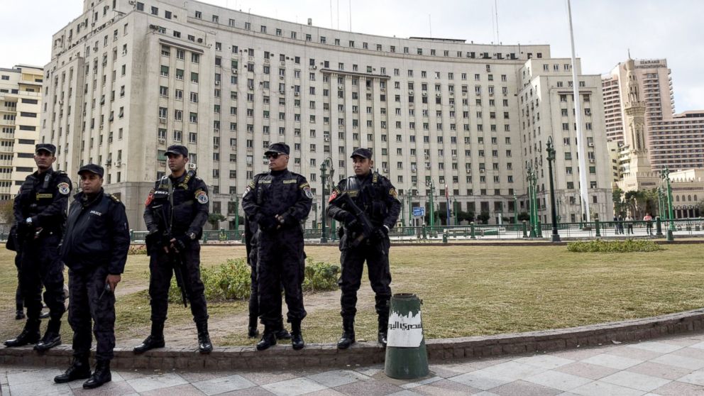 Members of the Egyptian police special forces stand guard on Cairo's landmark Tahrir Square, Jan. 25, 2016.
