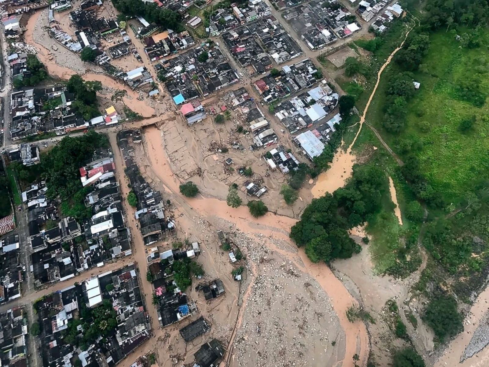 Colombia looks for victims and survivors after flash floods Photos ...