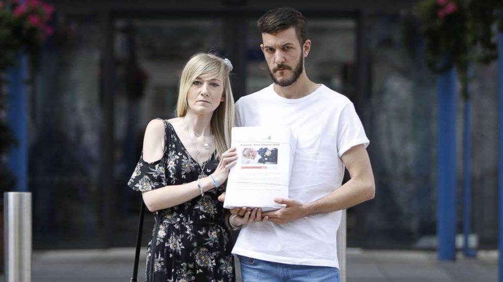 PHOTO: Connie Yates, left, and Chris Gard, parents of terminally-ill 10-month-old Charlie Gard, pose with a petition of signatures supporting their case, July 9, 2017.  
