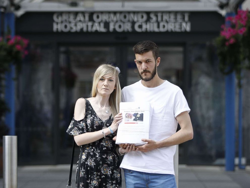 PHOTO: Connie Yates, left, and Chris Gard, parents of terminally-ill 10-month-old Charlie Gard, pose with a petition of signatures supporting their case, July 9, 2017.