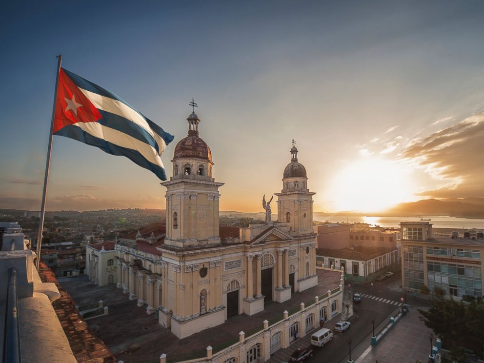 PHOTO: A Cuban flag is pictured over Plaza de la Cathdral in Santiago de Cuba, Cuba in this undated stock photo.