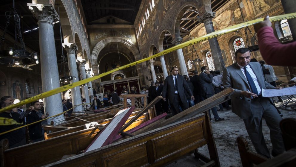 PHOTO: Egyptian security forces inspect the scene of a bomb explosion at the Saint Peter and Saint Paul Coptic Orthodox Church, Dec. 11, 2016, in Cairo's Abbasiya neighborhood.