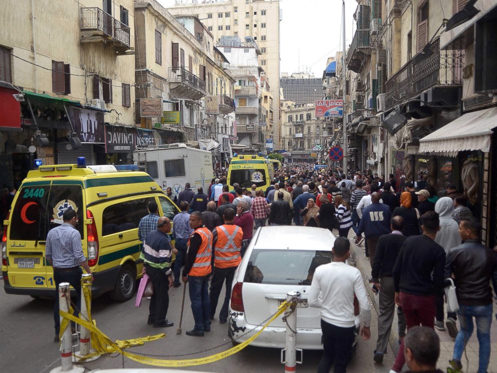 PHOTO: Egyptians gather near a church after a bomb blast struck worshippers gathering to celebrate Palm Sunday on April 9, 2017 in Alexandria, Egypt.