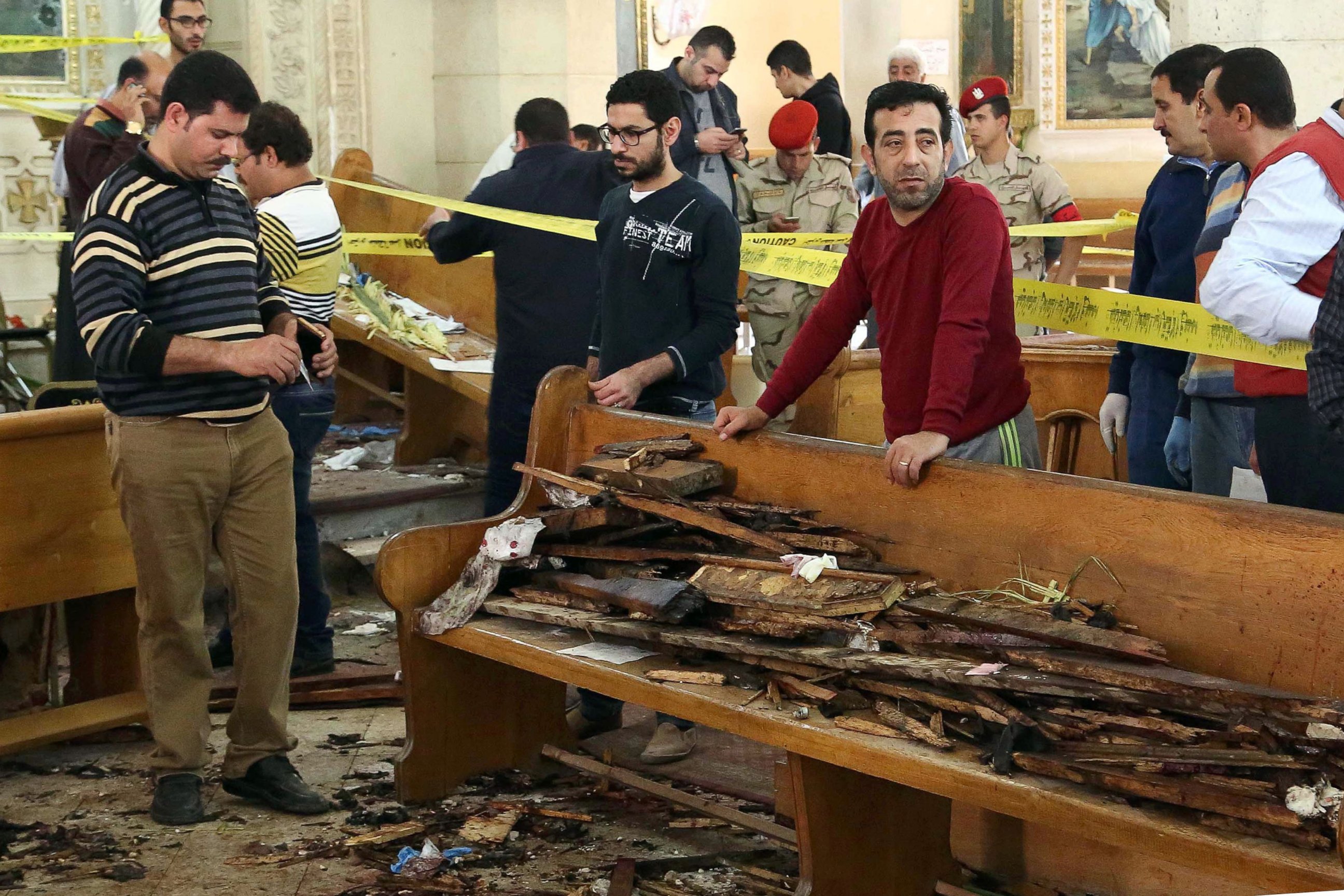 PHOTO: A general view shows forensics collecting evidence at the site of a bomb blast which struck worshippers gathering to celebrate Palm Sunday at the Mar Girgis Coptic Church in the Nile Delta City of Tanta, 75 miles north of Cairo, April 9, 2017. 