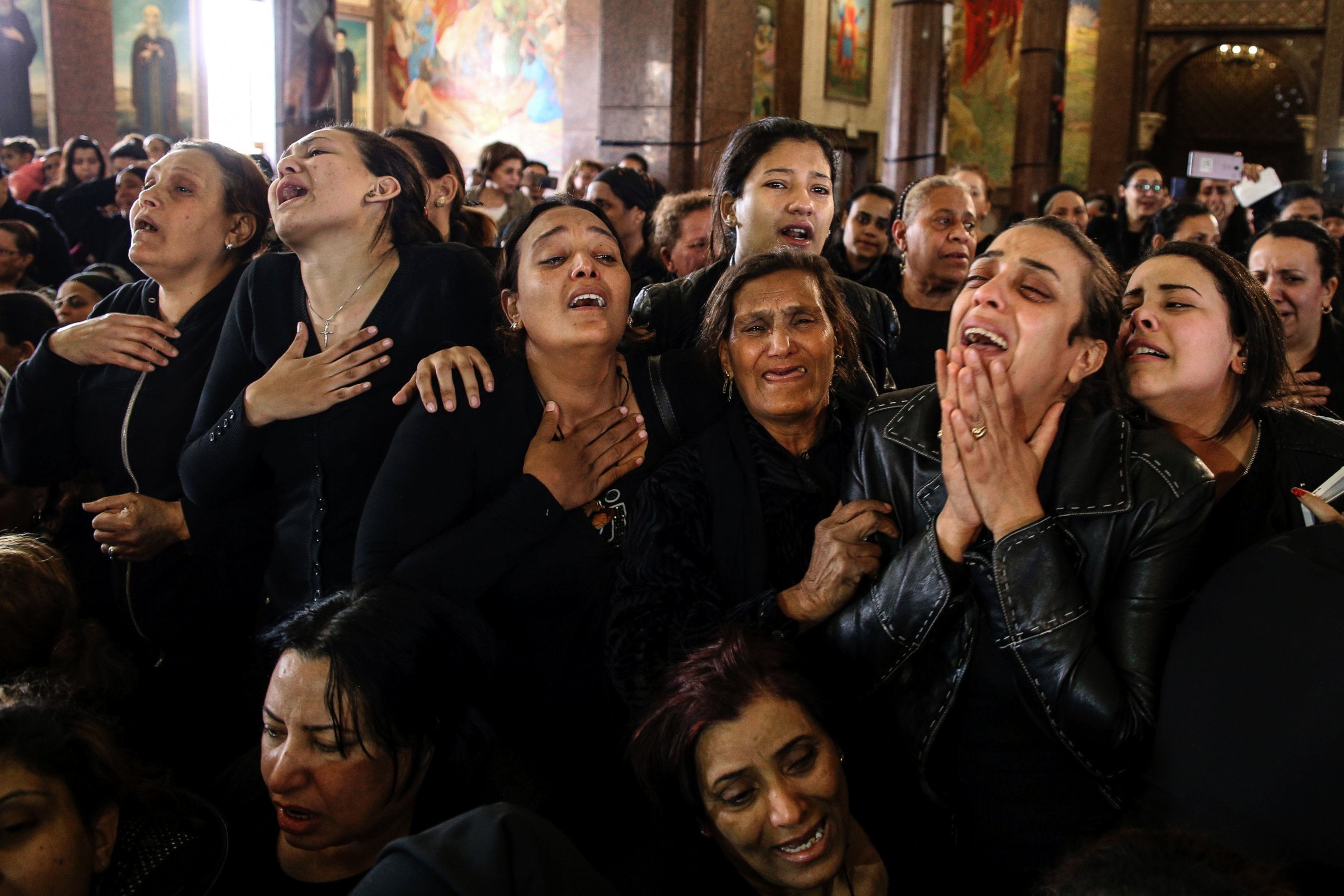PHOTO: Women cry during the funeral for those killed in a Palm Sunday church attack in Alexandria Egypt, at the Mar Amina church, April 10, 2017. 