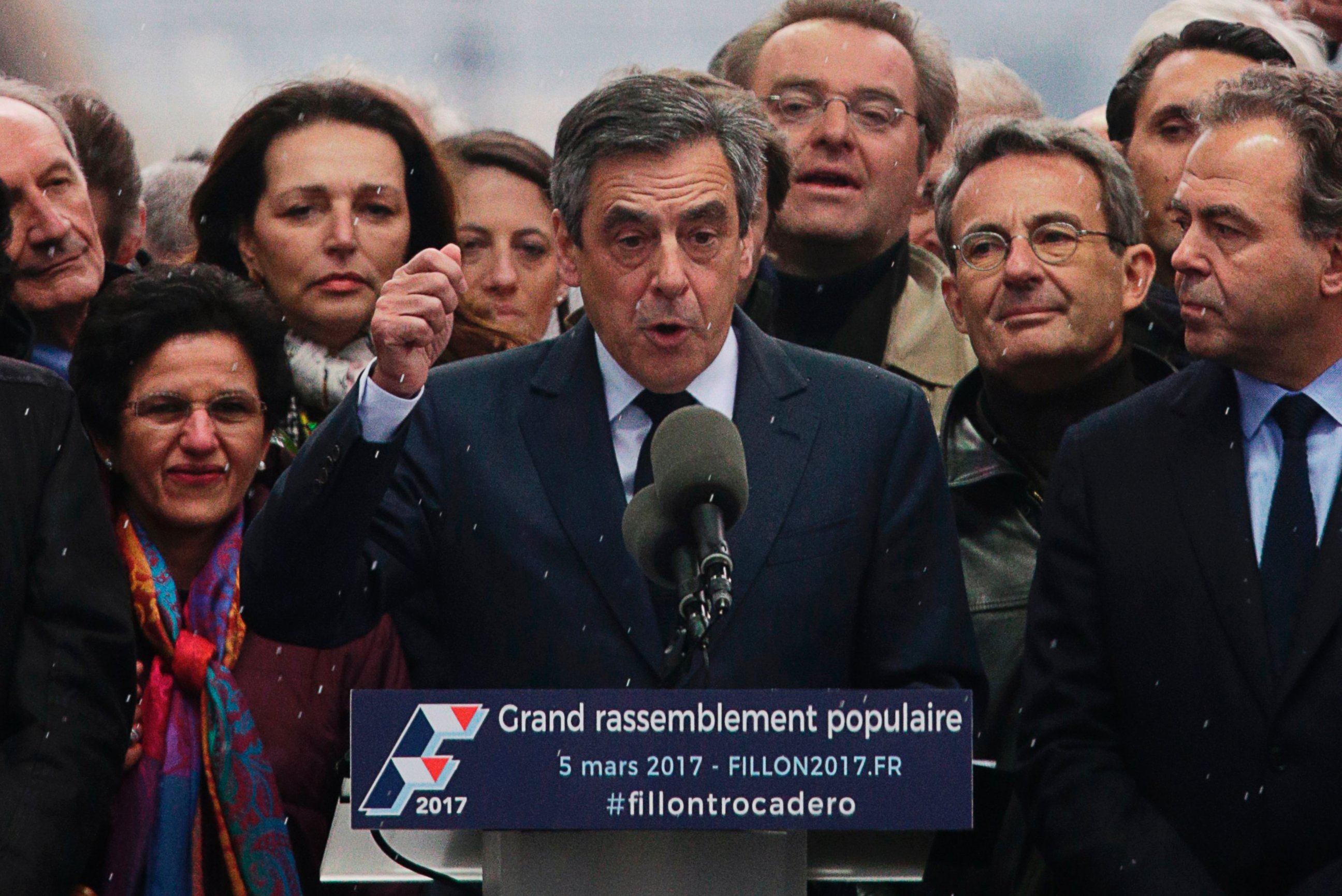 PHOTO: French presidential candidate for the right-wing Les Republicains party Francois Fillon, center, gestures as he delivers a speech on stage during a rally at the place du Trocadero, in Paris, March 5, 2017.