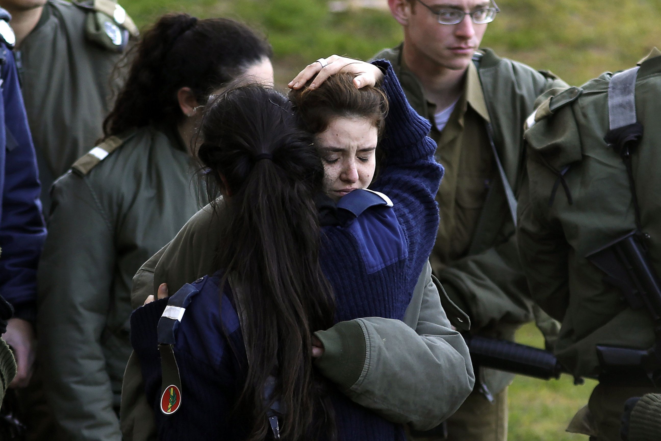 PHOTO: An Israeli soldier is consoled as she cries at the site of a vehicle-ramming attack in Jerusalem, Jan. 8, 2017.