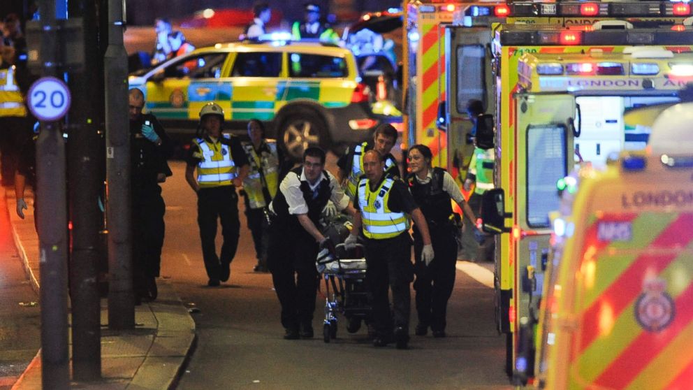 PHOTO: Police officers and members of the emergency services attend to a person injured in an apparent terror attack on London Bridge in central London on June 3, 2017.