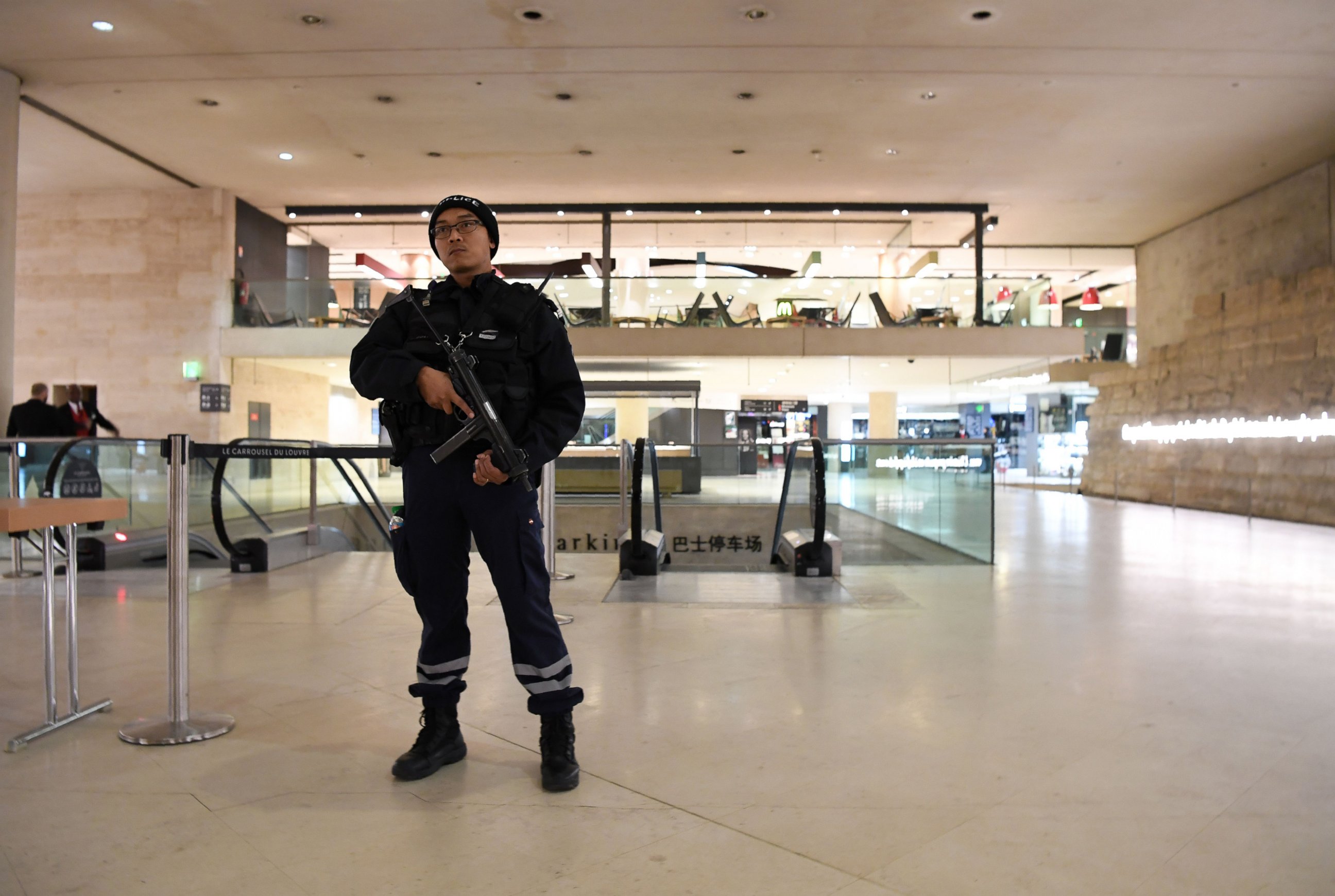 PHOTO: An armed French policeman patrols at the Louvre Museum, Feb. 3, 2017 in Paris, after a soldier patrolling at the museum shot and seriously injured a machete-wielding man, police said.
