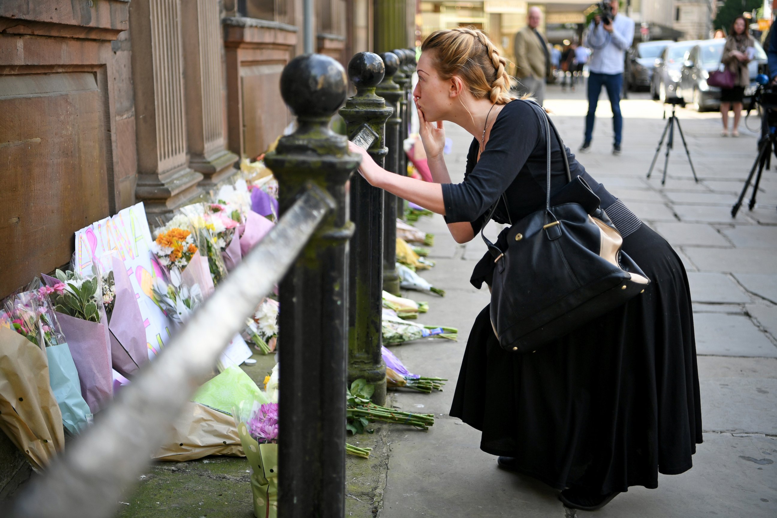 PHOTO: Members of the public lay flowers in St Ann Square, May 23, 2017, in Manchester, England.