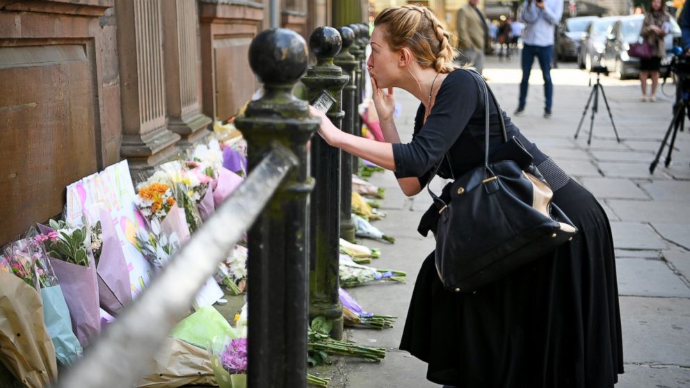 PHOTO: Members of the public lay flowers in St Ann Square, May 23, 2017, in Manchester, England.