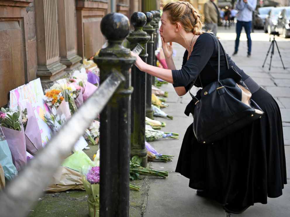 PHOTO: Members of the public lay flowers in St Ann Square, May 23, 2017, in Manchester, England.