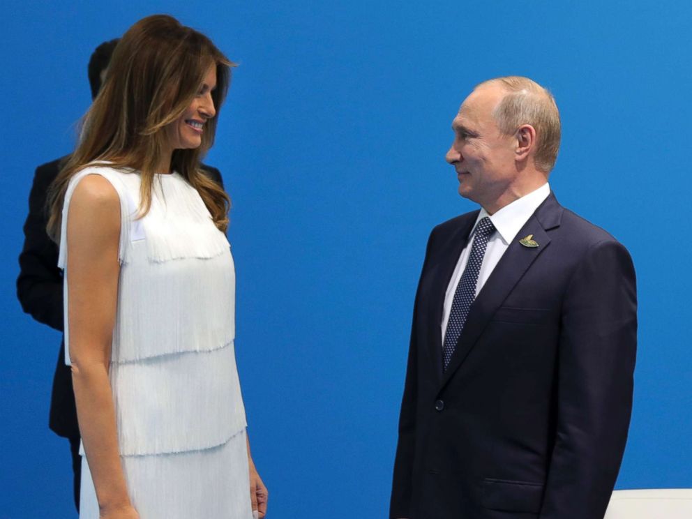 PHOTO: Russian President Vladimir Putin greets first lady Melania Trump during the G20 summit in Hamburg Germany, July 7, 2017.