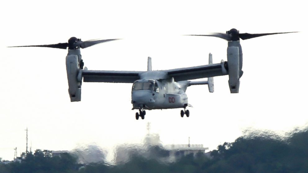 A MV-22 Osprey aircraft land at U.S. Marine Corps Futenma Air Station, Aug. 12, 2013, in Ginowan, Okinawa, Japan. The additional deployment, followed by August 3, have been postponed due to the HH-60 helicopter crash at Camp Hansen on August 5, fuels anger to local Okinawa people demanding the explanation of the cause of the crash.