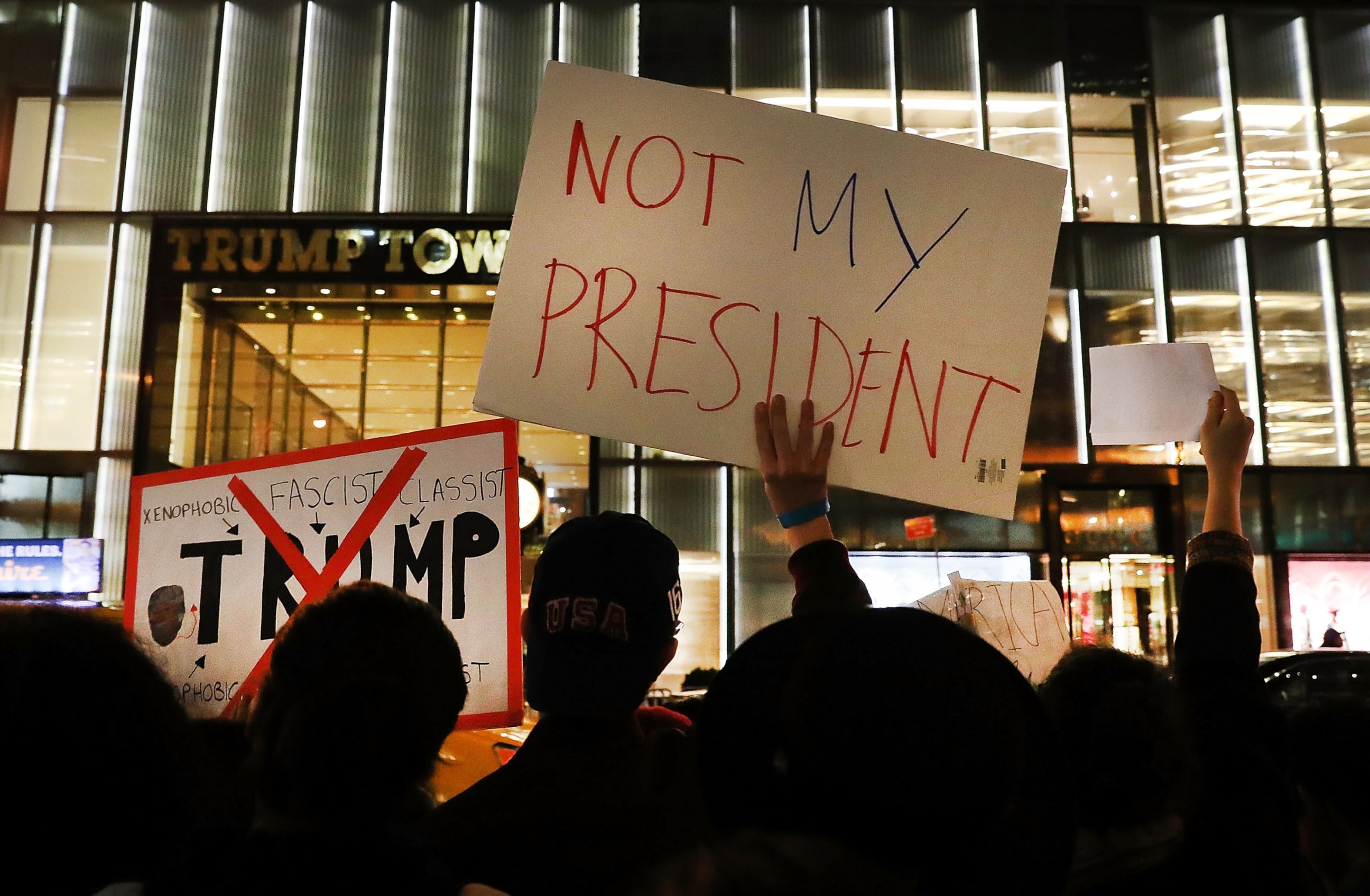 PHOTO: Dozens of anti-Donald Trump protesters stand along 5th Avenue in front of Trump Tower as New Yorkers react for a second night to the election of Trump as president of the United States, Nov. 10, 2016 in New York City.